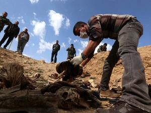 Mass graves have previously been found in a number of areas recaptured from Daesh, including the Sinjar district where the group massacred members of the Yezidi religious minority. (AFP/File)
