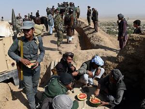 Anti-Taliban armed Afghan fighters eat watermelons on their outpost on a hilltop during a patrol against Taliban insurgents at Qara Ghoily in Almar district of northern Faryab province in this photo taken on Oct 16, 2015. (AFP/File) Anti-Taliban armed Afghan fighters eat watermelons on their outpost on a hilltop during a patrol against Taliban insurgents at Qara Ghoily in Almar district of northern Faryab province in this photo taken on Oct 16, 2015. (AFP/File)