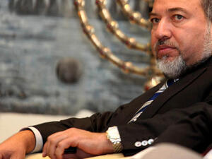 Avigdor Lieberman, who is set to become Israel's new defence minister, worked as a nightclub bouncer before embarking on a political career marked by anti-Palestinian tirades and strident populism. (AFP/File)
