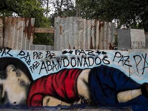 A graffiti depicting Aylan Kurdi, a 3-year-old Syrian boy drowned off a beach in Turkey, seen in Sorocaba, some 90km from Sao Paulo, Brazil. (AFP/File)