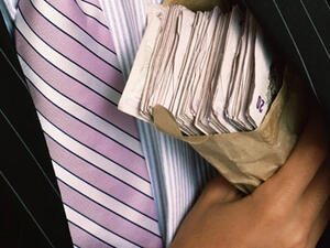 Carrying large wads of cash in your pocket can be impractical and risky. (Rex images)