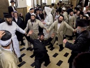 Rabbis and ultra-orthodox jews dancing. (YouTube)