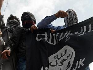 Daesh supporters wave the Shahada flag. (AFP/File)
