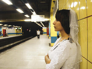 In early 2015, an unwed Egyptian woman named Samah Hamdi appeared in photos and video going through her daily routine donning a wedding gown and a veil in an attempt to ridicule communal pressure on Egyptian women to marry. (Courtesy photo)