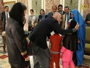 Sharbat Gula, seen in this image dressed in blue, the subject of the "Afghan Girl" National Geographic cover, was deported from Pakistan to Afghanistan on Wednesday and met with Afghan President Ashraf Ghani. (Courtesy photo)