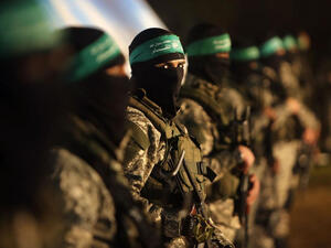 Palestinian members of the Ezzedine al-Qassam Brigades, the armed wing of the Hamas movement, take part in a gathering on January 31. (AFP/File)