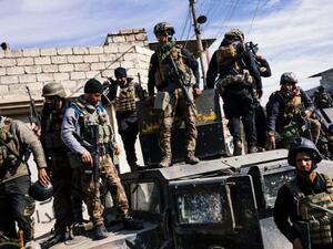 Members of the Iraqi special forces Counter Terrorism Service (CTS) hold a position in Eastern Mosul. (AFP/File)