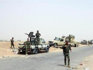 Iraqi soldiers stationed on the outskirts of Mosul. (AFP/File)