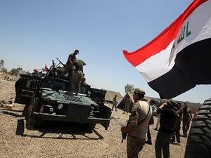 Iraqi security forces on the outskirts of Fallujah prepare to liberate the city. (AFP/File)