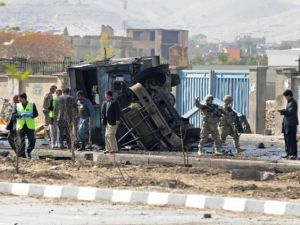 Afghanistan's security force and rescue personnel and NATO troops inspect the site of a suicide attack. (AFP/File)
