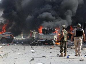 Fighters from the pro-government forces loyal to Libya's Government of National Accord (GNA) look at some of their vehicles burning after a Daesh bomber detonated his explosives close to a group of soldiers in an area of central Sirte on August 16, 2016. (AFP/File) Fighters from the pro-government forces loyal to Libya's Government of National Accord (GNA) look at some of their vehicles burning after a Daesh bomber detonated his explosives close to a group of soldiers in an area of central Sirte on August 16, 2016. (AFP/File)