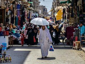 An Egyptian man walks down the street at the Khan al-Khalili market in Cairo on May 20, 2016. (AFP/File)