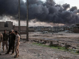 Iraqi oil fields on fire outside of Mosul. (AFP/File)