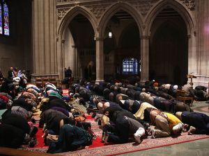 Muslims participate in a Friday prayer November 14, 2014 at the National Cathedral in Washington. (AFP/File)
