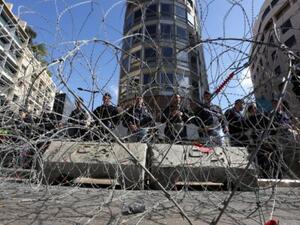 Barb-wires surrounding Nejmeh square, in downtown Beirut, where the parliament discussions are being held. (File photo)