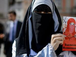 The law states that clothing which obscures or covers the face cannot be worn in government offices, schools, cultural institutions, and public places of recreation. (AFP/File)