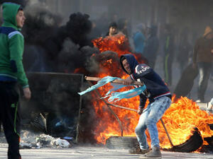 Palestinian youths clash with Israeli security forces in Qabatiya, a town near Jenin. (AFP/File)