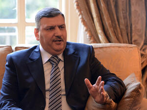 Riyad Hijab in Cairo on 11 February 2013. (AFP/File)