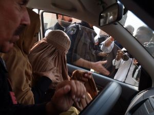 Sharbat Gula became famously known as the "Mona Lisa of the Afghan war" when National Geographic photographer Steve McCurry captured her photograph. (AFP/Majeed)