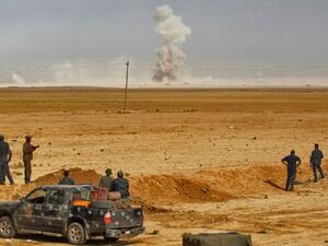 Smoke billows as Iraqi forces hold a position on October 17, 2016 near Mosul. (AFP/File)