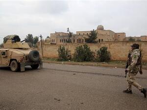 Iraqi soldiers patrol a street on January 22, 2017 next to a church on the northern outskirt of Mosul, which was destroyed by Daesh militants. (AFP/File)