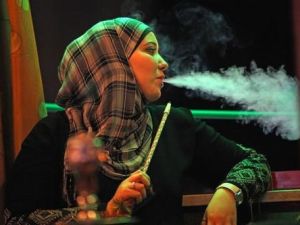 Illustrative photo of woman smoking shisha. (Pinterest)