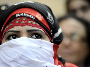 While everyone living with the virus may face stigma, women living with HIV face a "double burden". (AFP/Filippo Monteforte)