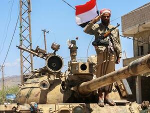 A Yemeni fighter loyal to the country's exiled president salutes on top of a tank at a checkpoint in Taez on Apr 11, 2016. (AFP/Ahmad Al-Basha) A Yemeni fighter loyal to the country's exiled president salutes on top of a tank at a checkpoint in Taez on Apr 11, 2016. (AFP/Ahmad Al-Basha)