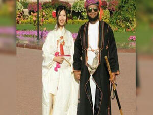 The two royals are seen in traditional dress at their wedding ceremony. (File photo)