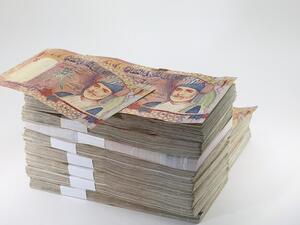 The Central Bank of Oman reported that in 2017, up to OMR3.7 billion was sent overseas by expatriates living in the country, a slight drop from the OMR3.95 billion the previous year. (Shutterstock)