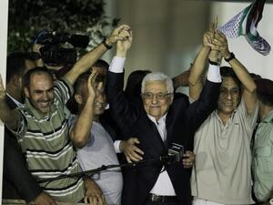 Palestinian President Mahmoud Abbas delivers a speech to released Palestinian prisoners, at his headquarters in the West Bank city of Ramallah, August 14, 2013. AFP PHOTO / ABBAS MOMANI