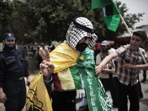 الفلسطينيون يحتفلون بالمصالحة بين فتح وحماس