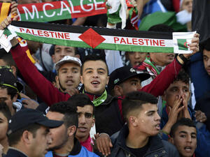 Algeria and Palestine are so close that during football matches, fans support both teams. (AFP/File)