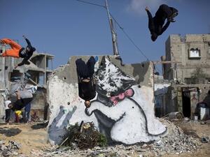 Israeli signboards banning entry of Israeli citizens to Palestinian cities are visible at the entrance to every Palestinian city. (AFP/Mohamed Abed)