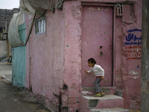 A Palestinian girl plays by her house in Gaza. (AFP/Mohammed Abed)