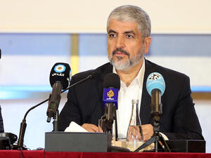 The chief of Hamas' political bureau speaks during the militant group's conference in Qatar, May 1 2017. (AFP/Karim Jafaar)