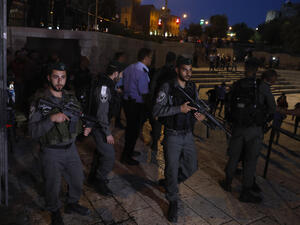 Israeli border police patrol the area where Fatima Afif Abd al-Rahman Hjeiji was killed on May 7. (AFP/Menahem Kahana)