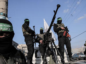 Members of the Ezzedine al-Qassam Brigades, the military wing of the Palestinian Islamist movement Hamas, take part in a rally marking the 29th anniversary of the creation of the movement on December 16, 2016 (AFP Photo/Said Khatib)