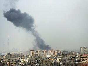 A smoke plume rises in Gaza City after a reported Israeli airstrike on March 18, 2017. (AFP/Mahmud Hams)