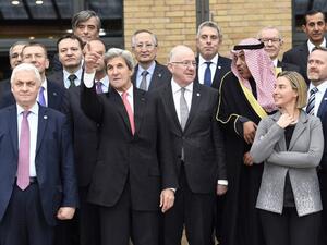 US Secretary of State John Kerry (2nd L) gestures next to Russian Ambassador to France Alexander Orlov (L) and European Union Foreign Policy Chief Federica Mogherini as they take part with other representatives during the Mideast peace conference in Paris on January 15, 2017. (AFP/Bertrand Guay)