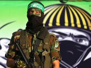 A member of the Ezzedine al-Qassam Brigades, the military wing of Palestinian movement Hamas (AFP)