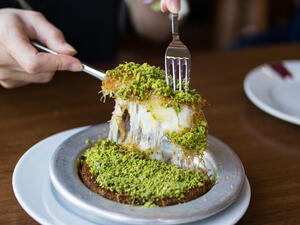 When someone graduates, buys a car, or even wants to reconcile with another after an argument, knafeh is delivered as a symbol to celebrate and anticipate good times. (shutterstock)