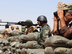 The central government on Friday began to deploy forces in the vicinity of Taza and Bashir villages, some 10 kilometers south of Kirkuk city after the withdrawal of the Peshmerga forces in the night (AFP/File)