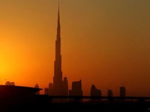 Burj Khalifa, the world tallest tower, is silhouetted at sunset in Dubai, on November 30, 2010. 