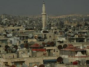 A picture taken 17 March 2006 shows a general view of the Syrian city of Aleppo, 350 kms north of Damascus, with satellite dishes dominating the roofs of its houses and buildings. 