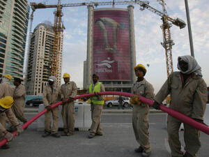 World Cup workers in Qatar are made to work for 12 hours at a time without a break.  They are not fed for entire days and denied access to drinking water. (Image credit: AFP)