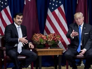 An awkward GIF has emerged from this excruciating meeting between US President Trump and Qatari Emir Sheikh Tamim bin Hamad Al Thani (AFP)