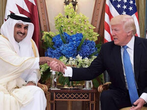 US President Donald Trump and Qatar's Emir Sheikh Tamim Bin Hamad Al- in Riyadh on 21 May, 2017 (AFP)