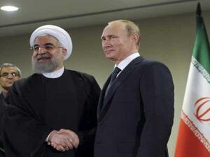  الرئيسان الايراني حسن روحاني والروسي فلاديمير بوتين
