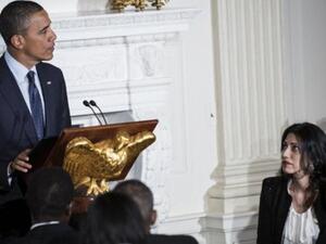 أوباما مع هوما عابدين خلال حفل إفطار في البيت الأبيض 